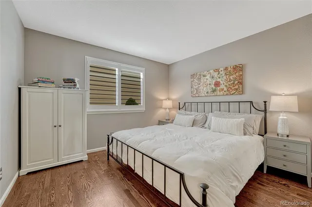 a bedroom with bed and a window