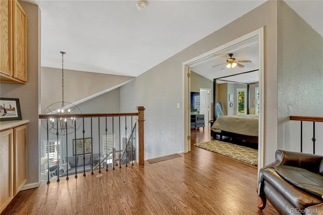 a bedroom with wooden floor