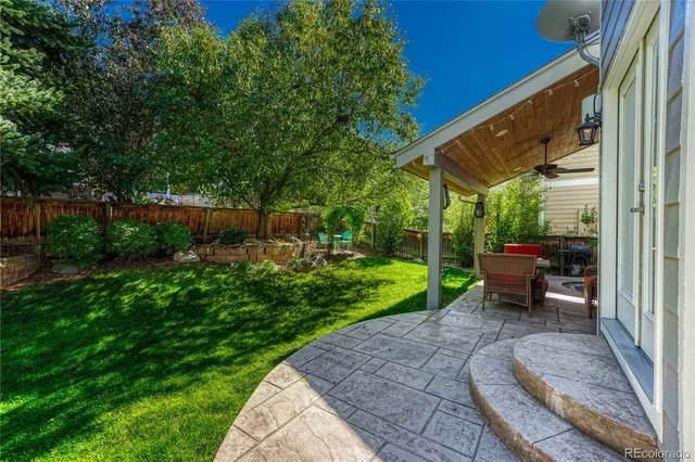 a garden view with a seating space