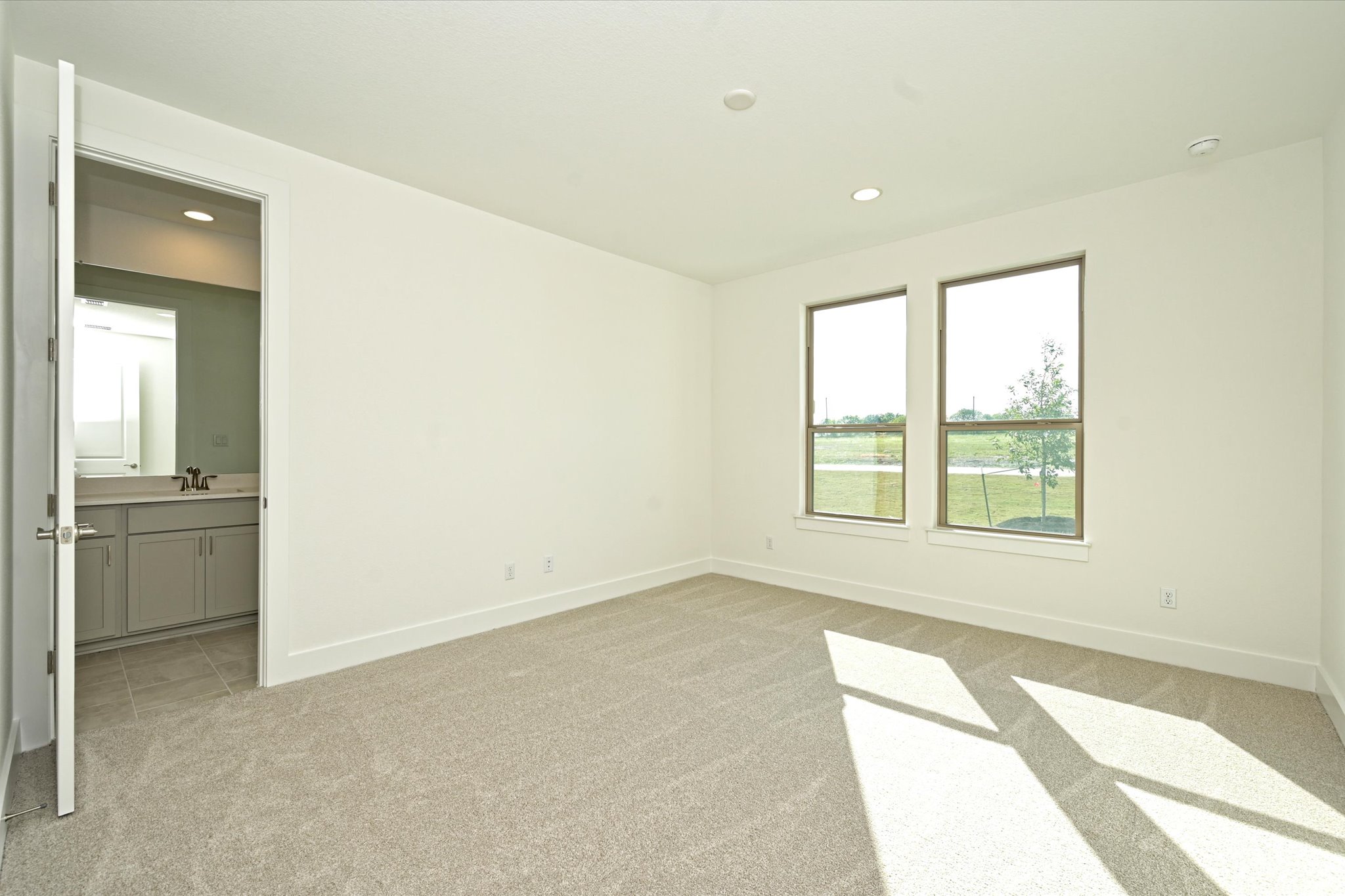 209 Scofield Avenue Georgetown, TX 78626 - Photo 22 of 33 a view of an empty room with a window