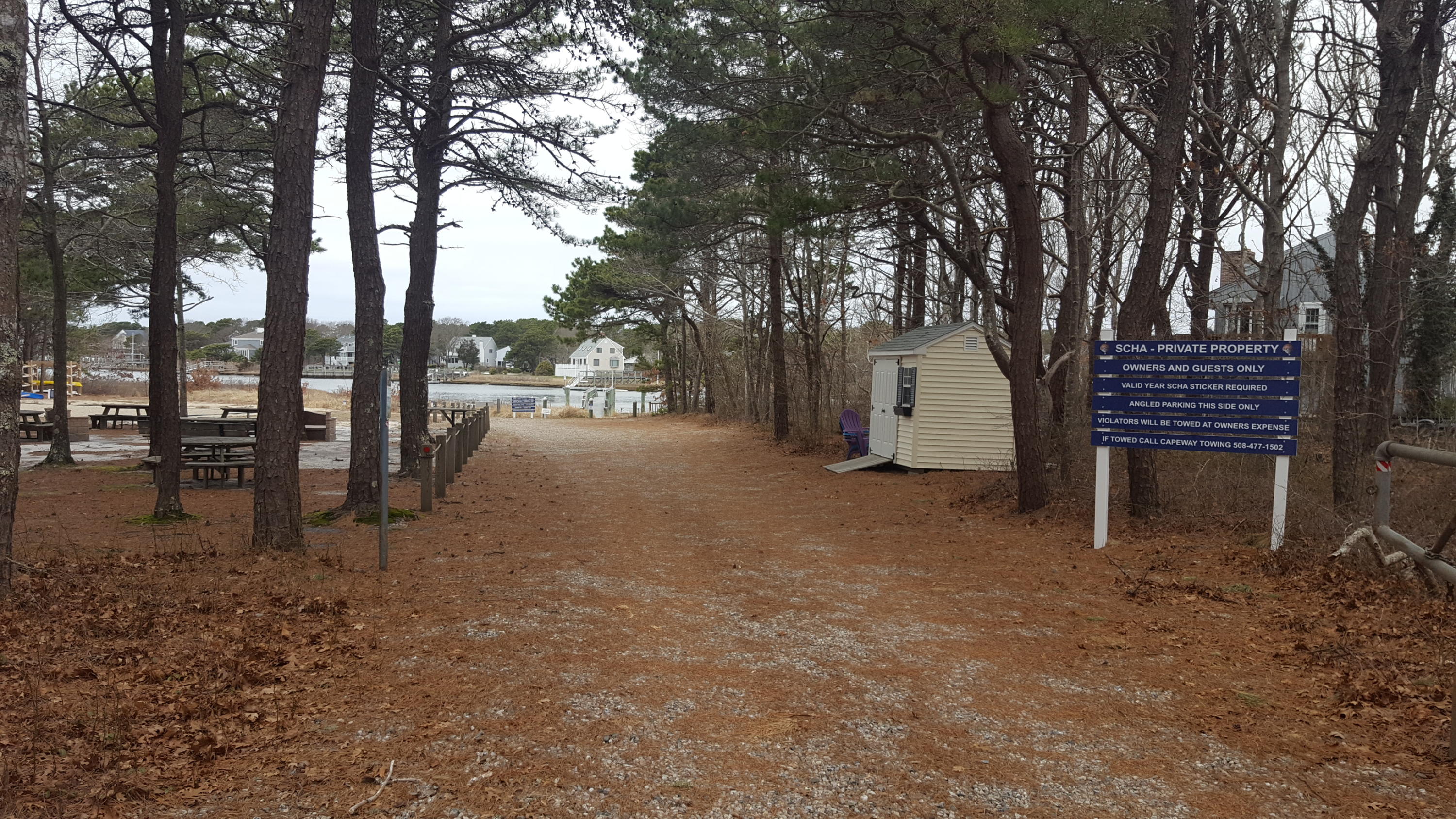 8 Nehoiden Road Mashpee, MA 02649 - Photo 28 of 47 a backyard of a house with table and chairs