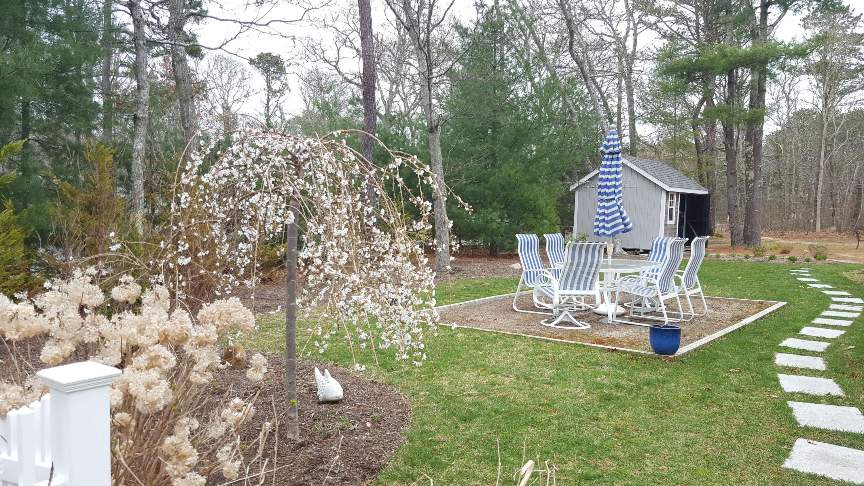 8 Nehoiden Road Mashpee, MA 02649 - Photo 3 of 47 a view of a house with backyard porch and sitting area