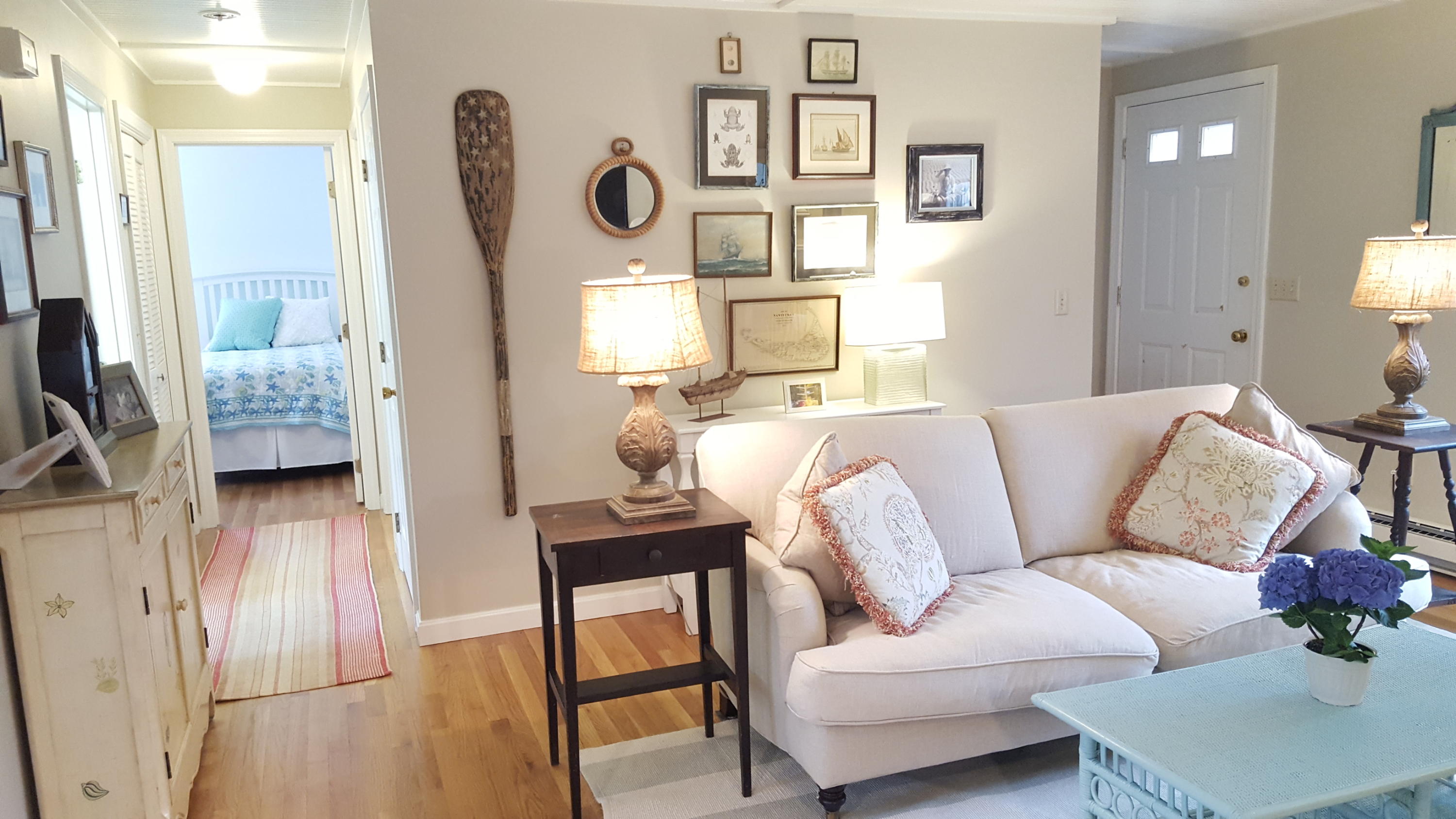 8 Nehoiden Road Mashpee, MA 02649 - Photo 6 of 47 a living room with furniture and a flat screen tv