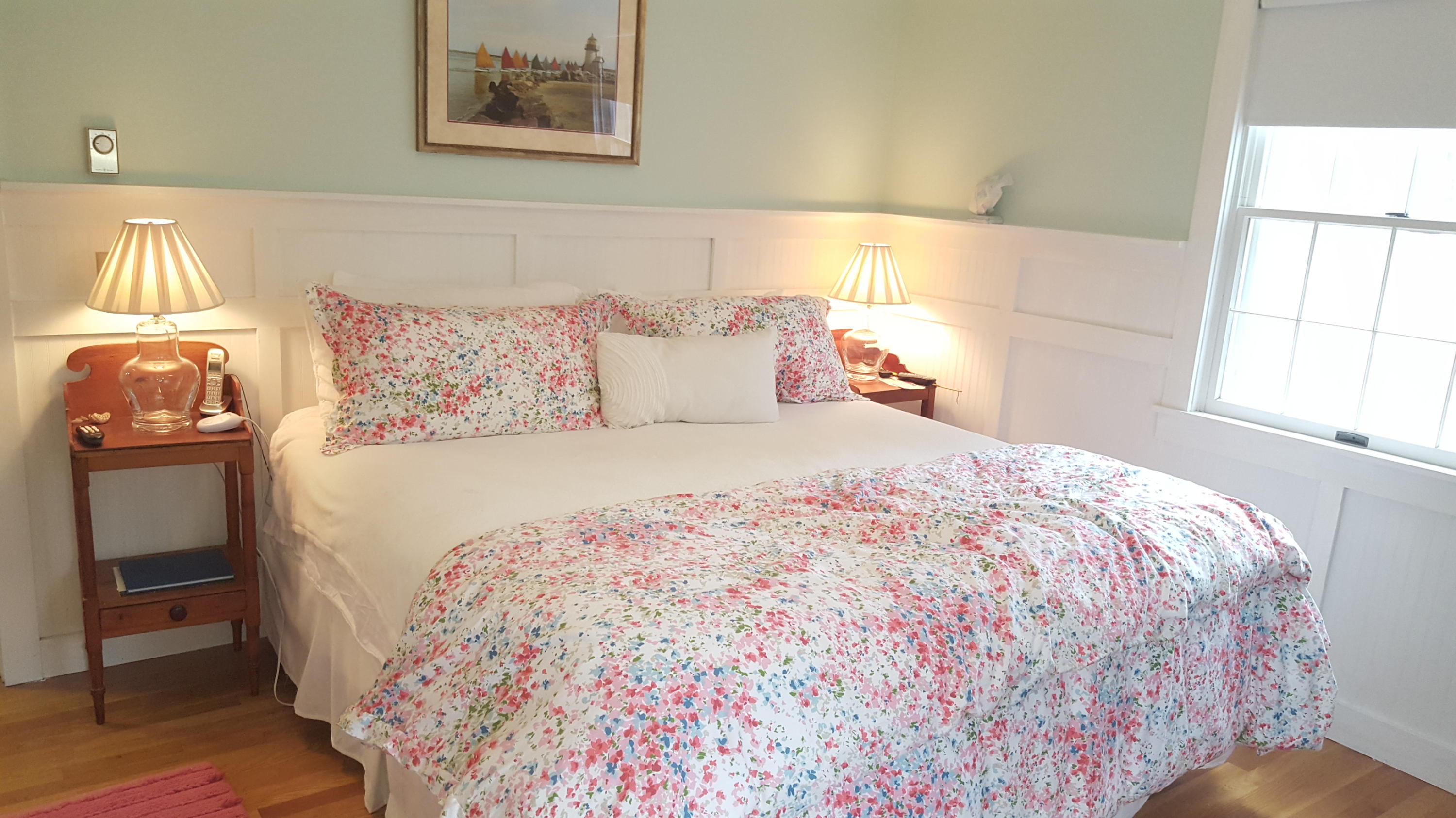 8 Nehoiden Road Mashpee, MA 02649 - Photo 9 of 47 a large bed sitting in a bedroom next to a window