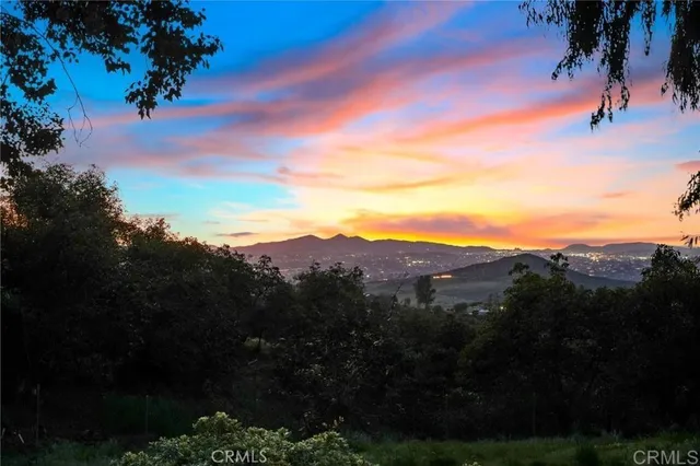 a view of a house with a street