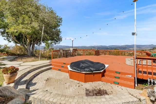 a view of a swimming pool with a lounge chairs