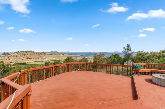 a view of a balcony with city view