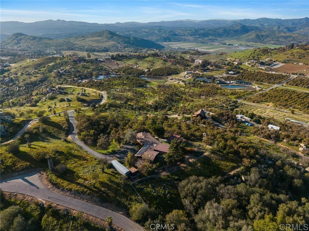 15735 Highland Valley Road Escondido, CA 92025 - Photo 10 of 38 an aerial view of residential houses with outdoor space and trees