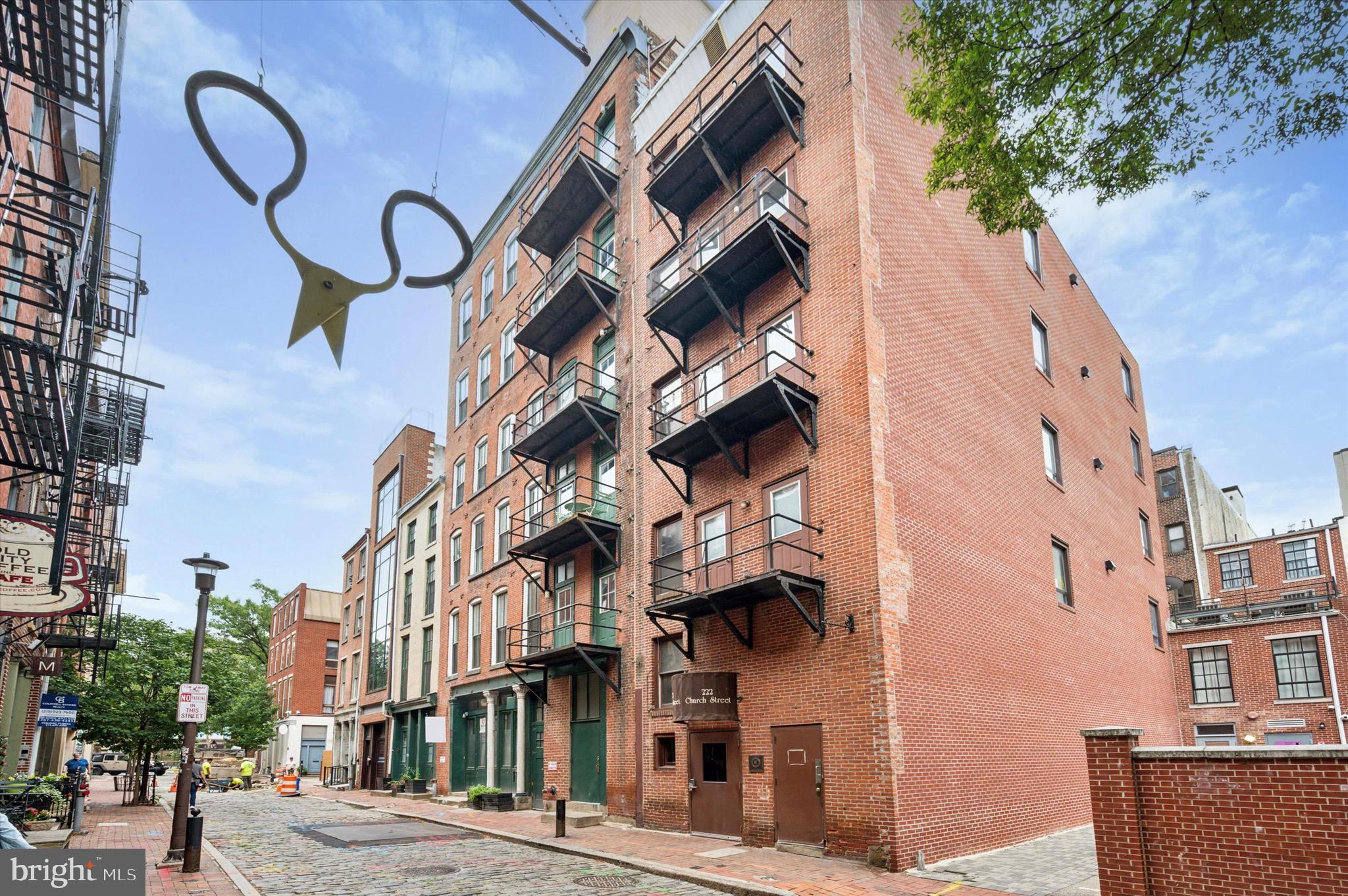 222 Church Street, Unit 2J Philadelphia, PA 19106 - Photo 1 of 17 a view of a building with a street