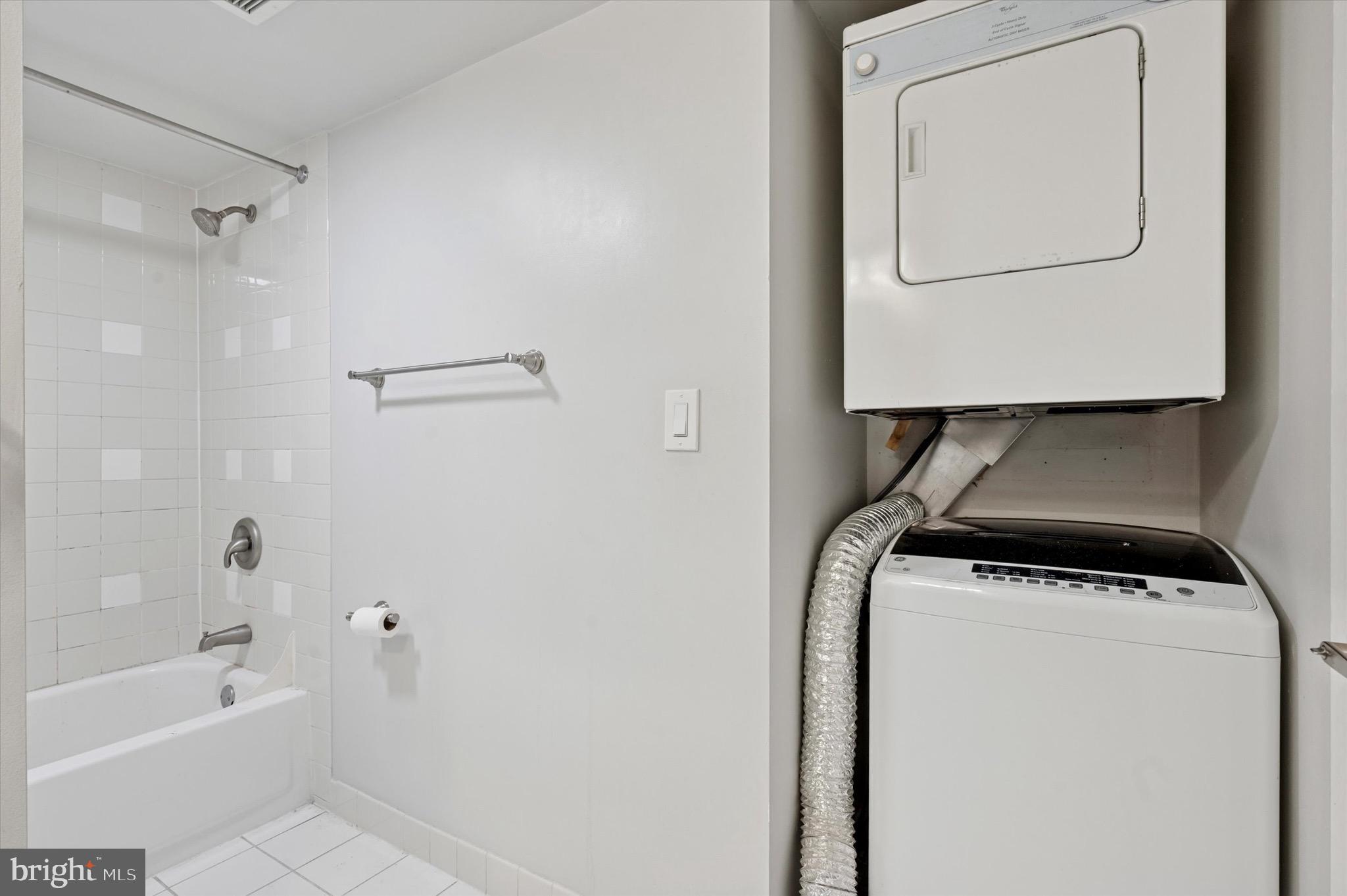222 Church Street, Unit 2J Philadelphia, PA 19106 - Photo 9 of 17 a bathroom with a bathtub and a shower
