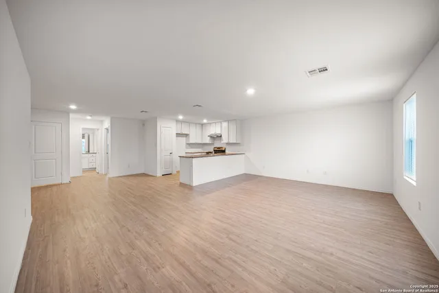 a view of kitchen with wooden floor
