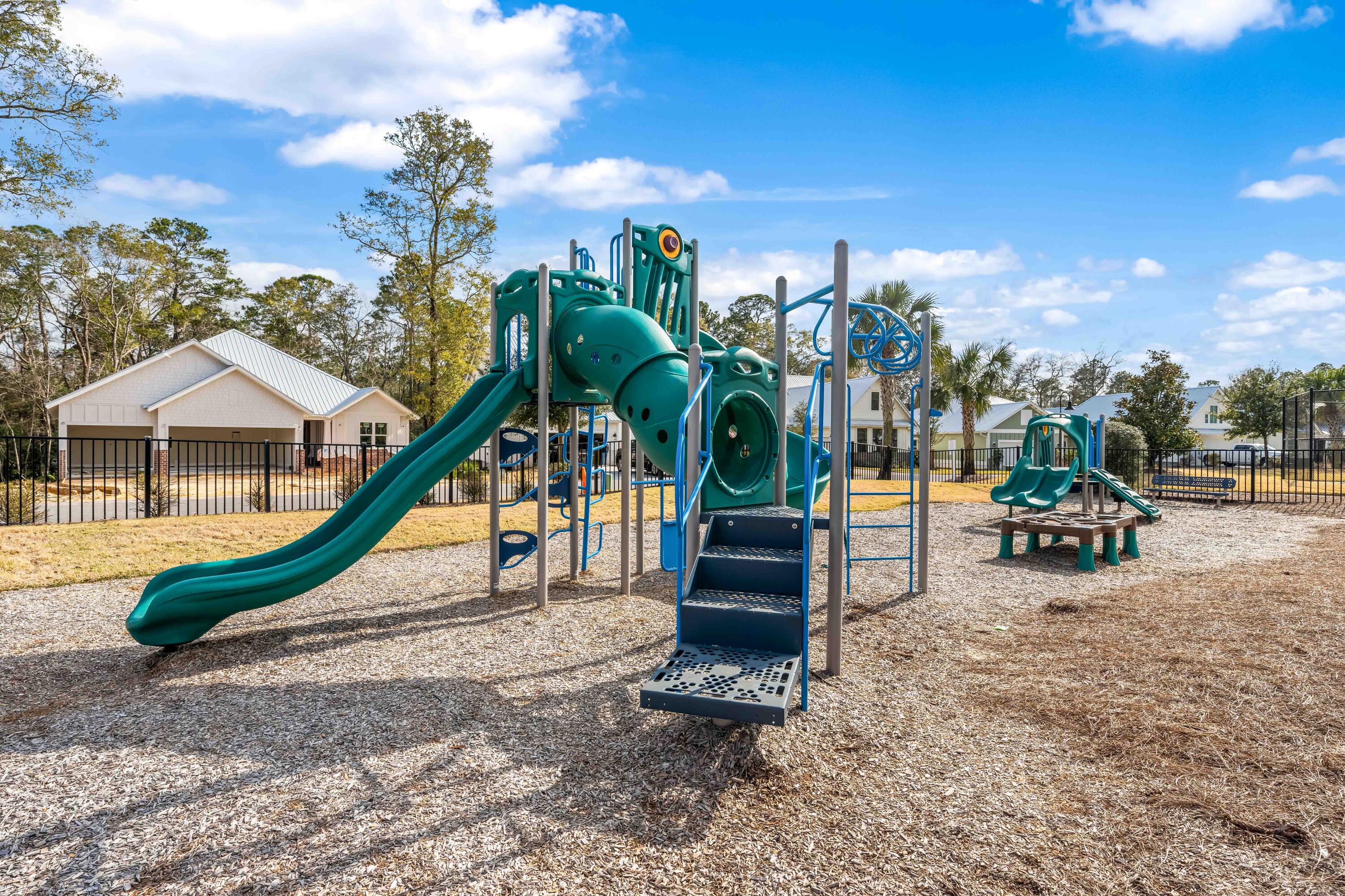 Lot 51 Muzzle Street Freeport, FL 32439 - Photo 17 of 26 a view of a park with swings and slides