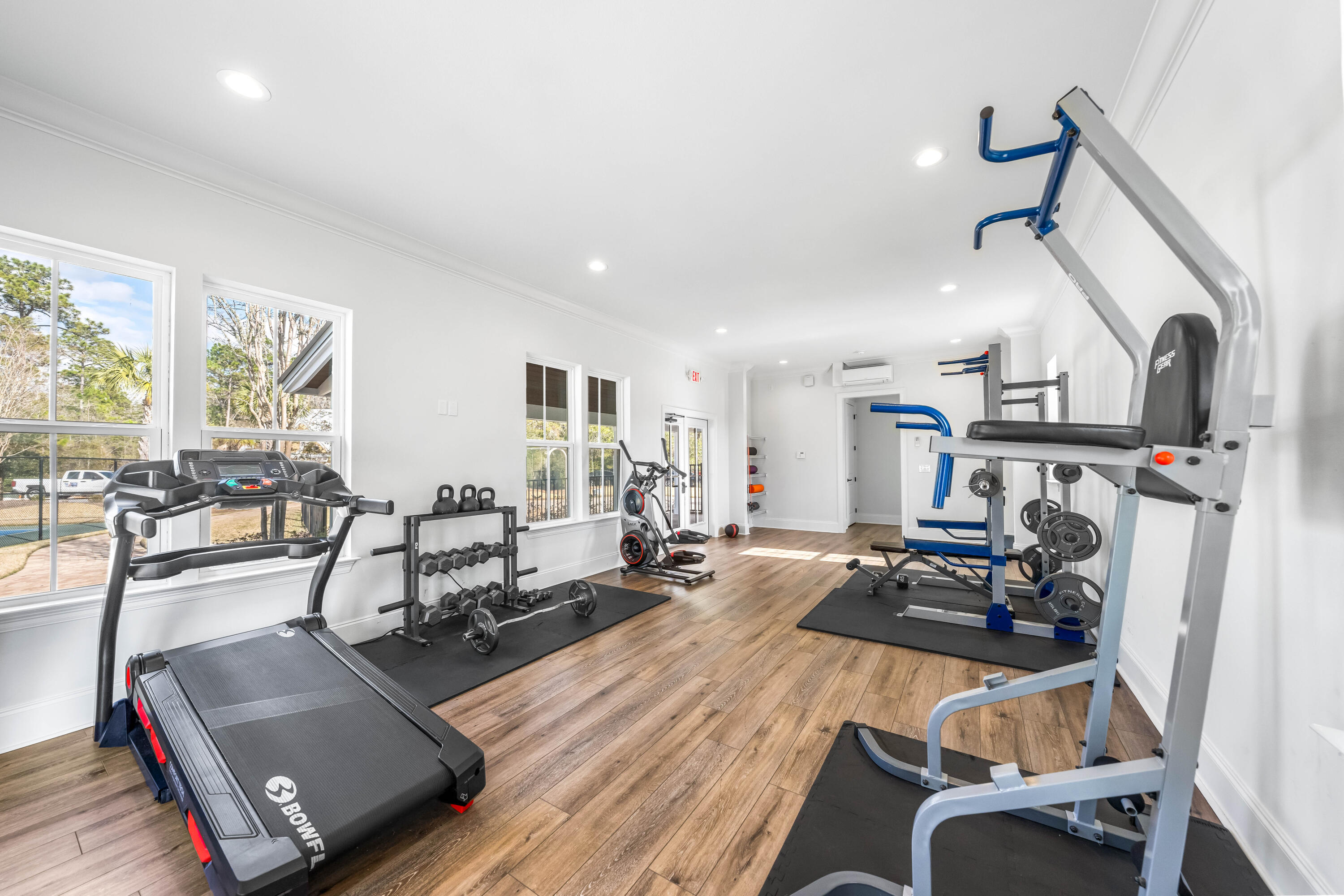 Lot 51 Muzzle Street Freeport, FL 32439 - Photo 18 of 26 a living room with furniture gym equipment and a large window