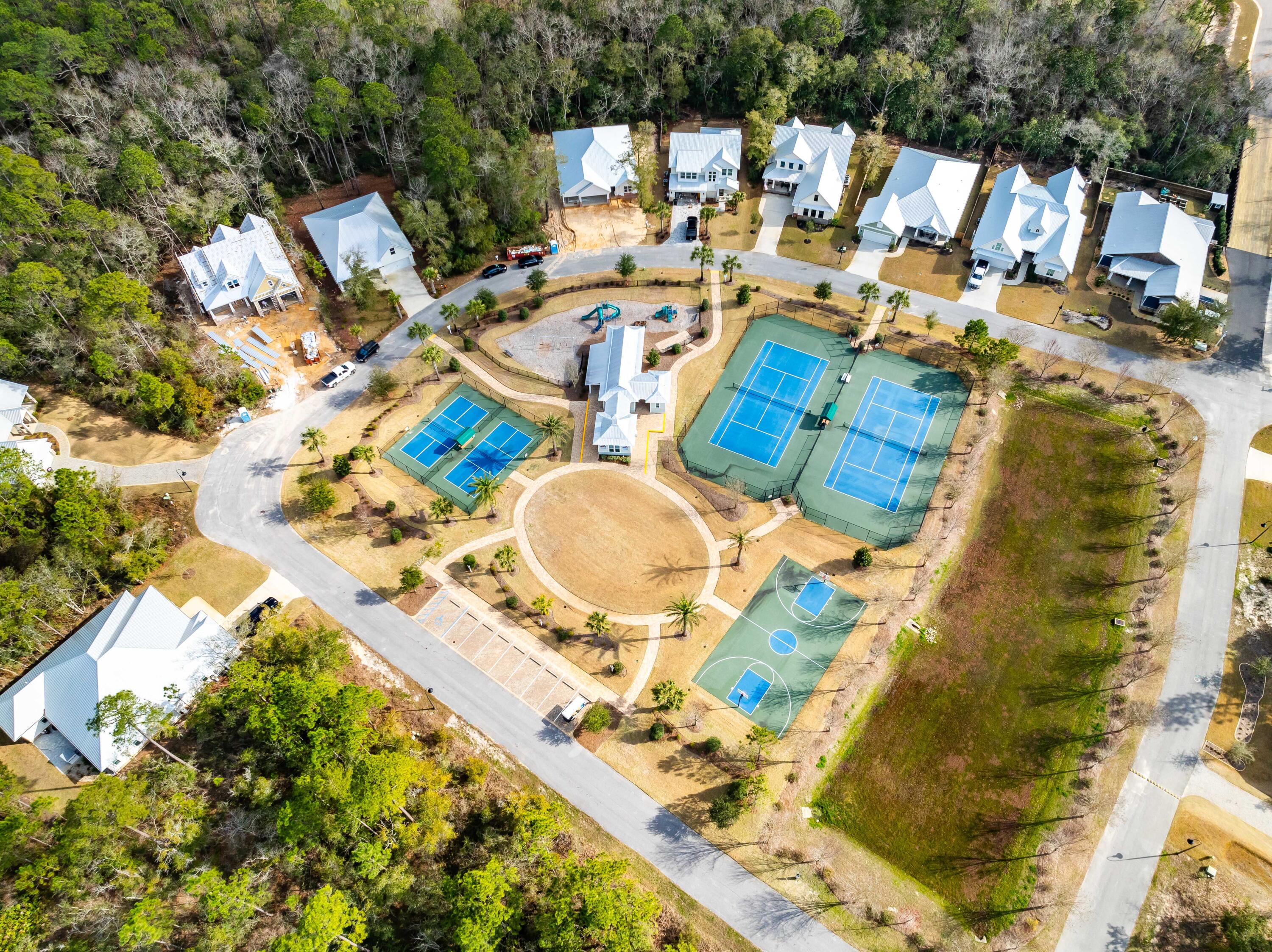 Lot 51 Muzzle Street Freeport, FL 32439 - Photo 26 of 26 a picture of a table and chairs in the patio