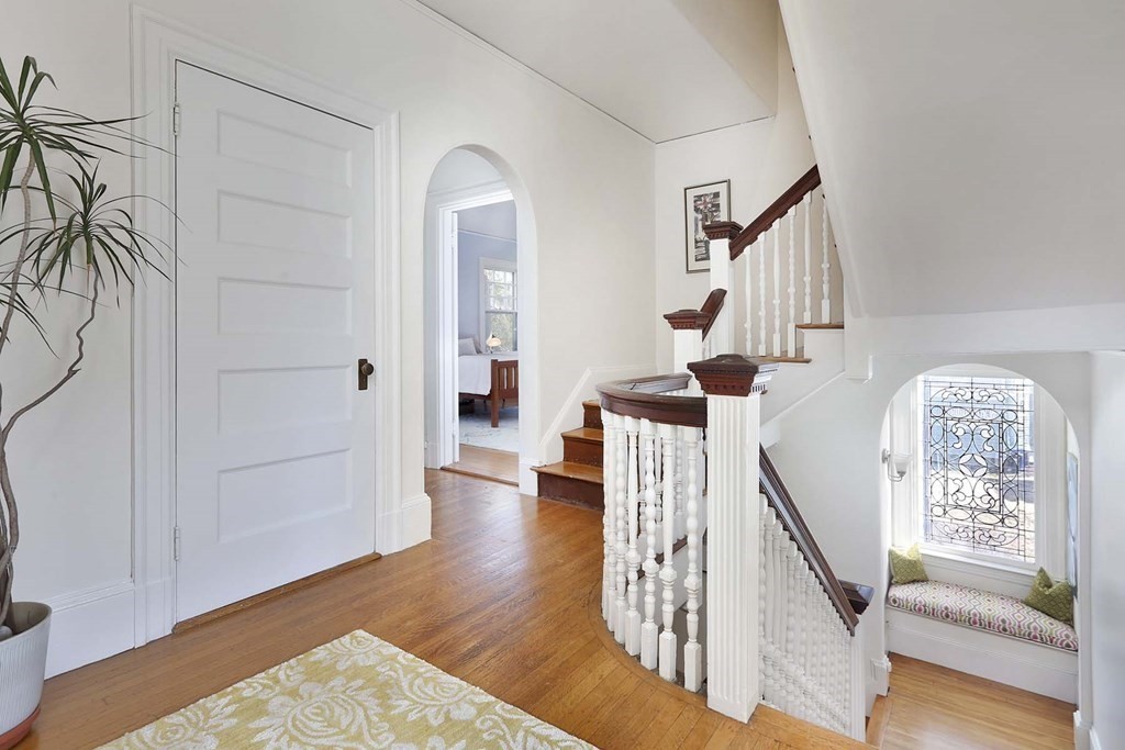 240 Clinton Road Brookline, MA 02445 - Photo 14 of 24 a view of entryway and hall with wooden floor