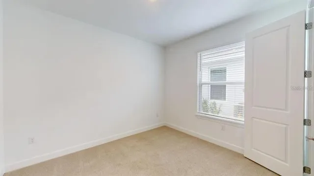 an empty room with a window