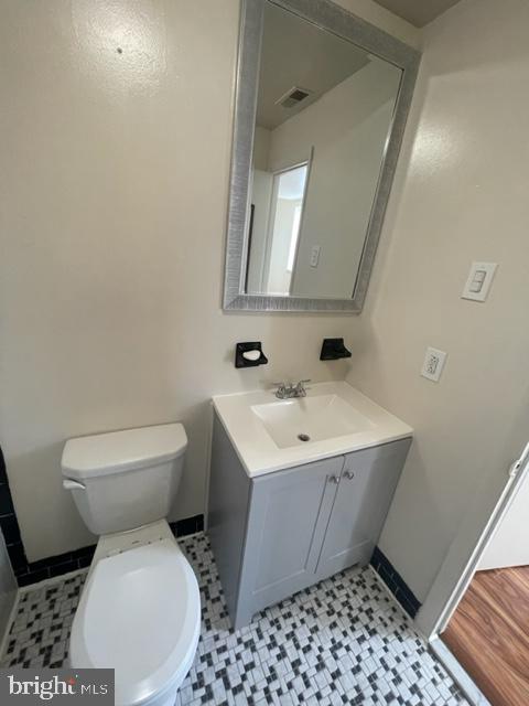 922 South 19th Street, Unit 3 Philadelphia, PA 19146 - Photo 6 of 6 a bathroom with a sink toilet and mirror