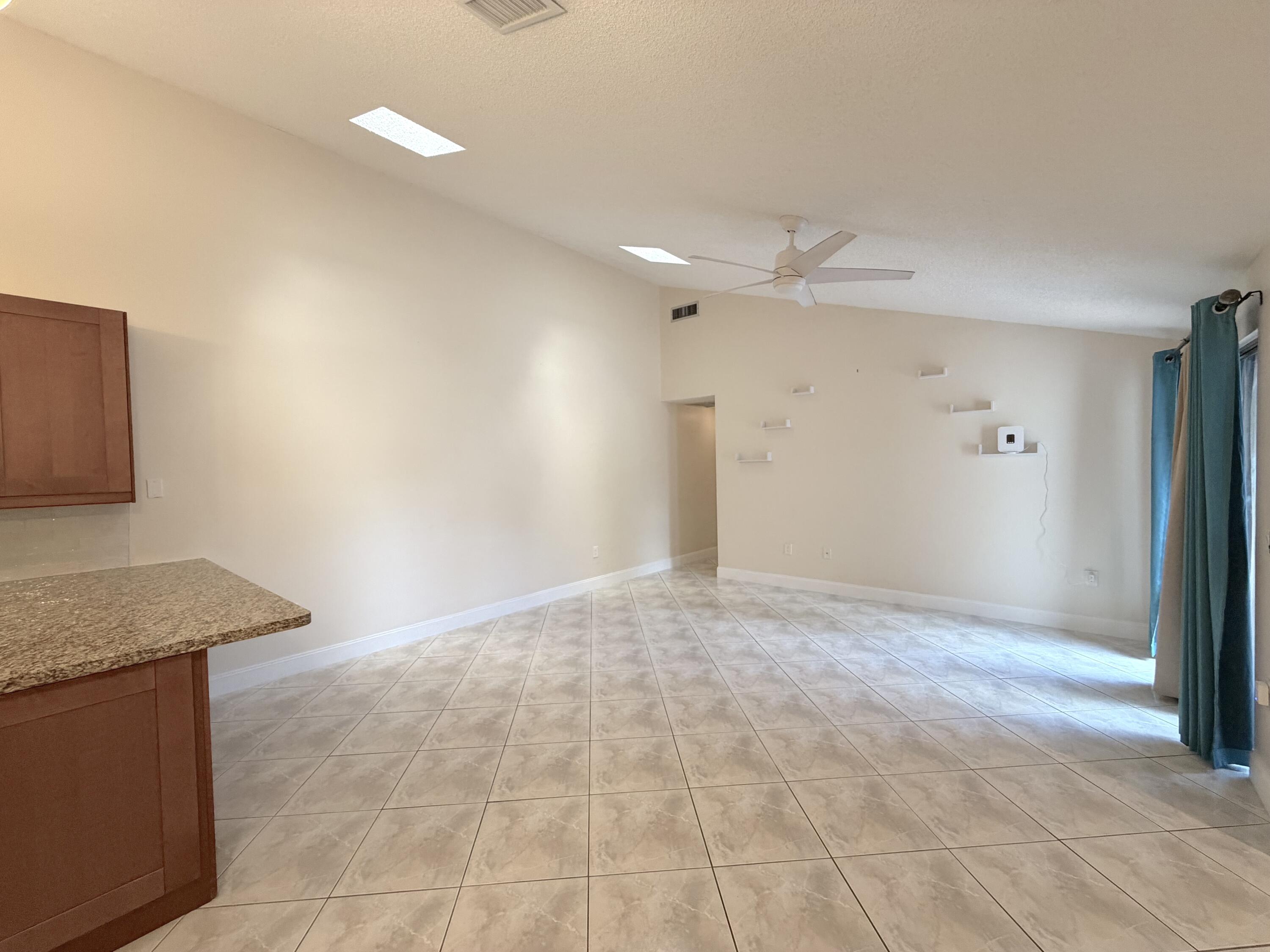 9927 Boca Gardens Trail, Unit A Boca Raton, FL 33496 - Photo 20 of 63 Kitchen/Dining Area