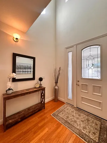 a view of a hallway with front door