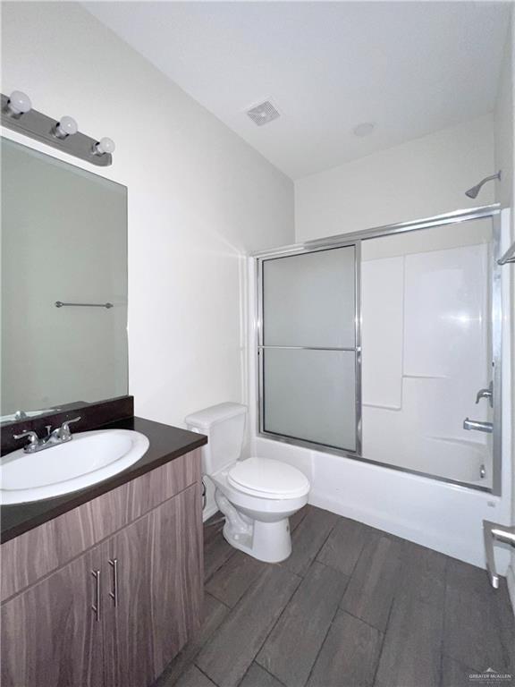 1609 West Cortlandt Street, Unit 3 Edinburg, TX 78541 - Photo 15 of 21 a bathroom with a sink a toilet and shower