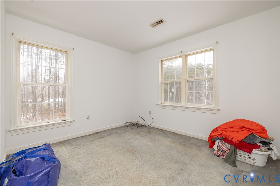 10 Rhodes Lane Cartersville, VA 23027 - Photo 4 of 16 Carpeted spare room