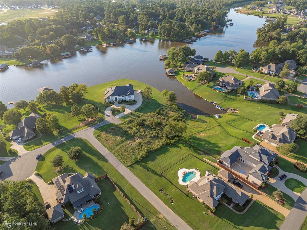 1104 Long Key Circle Benton, LA 71006 - Photo 11 of 11 an aerial view of a house a yard basket ball court and outdoor seating