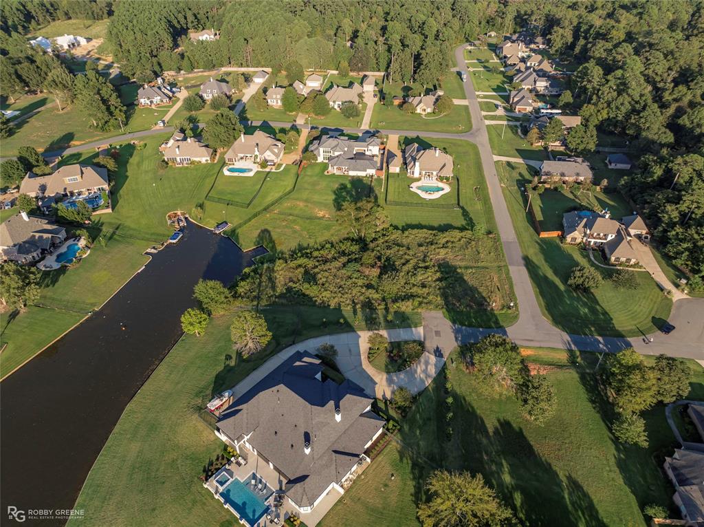 1104 Long Key Circle Benton, LA 71006 - Photo 7 of 11 an aerial view of residential houses with outdoor space
