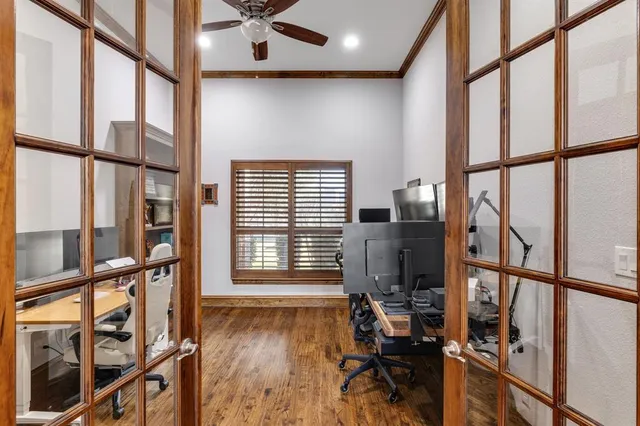 a view of an entryway with wooden floor