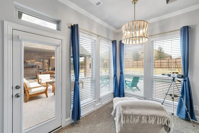a large bathroom with a large tub sink and mirror