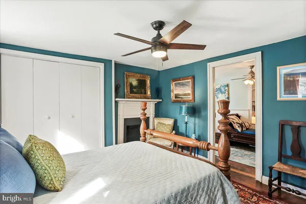 a bathroom with a sink a mirror and a toilet
