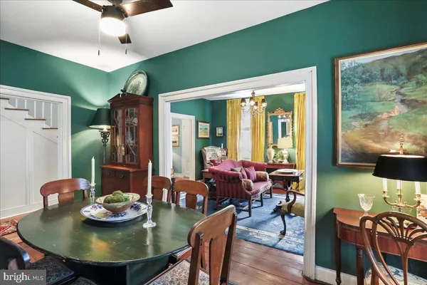 a view of a livingroom with furniture and a flat screen tv