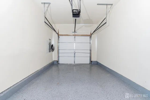 a view of an empty room with stairs