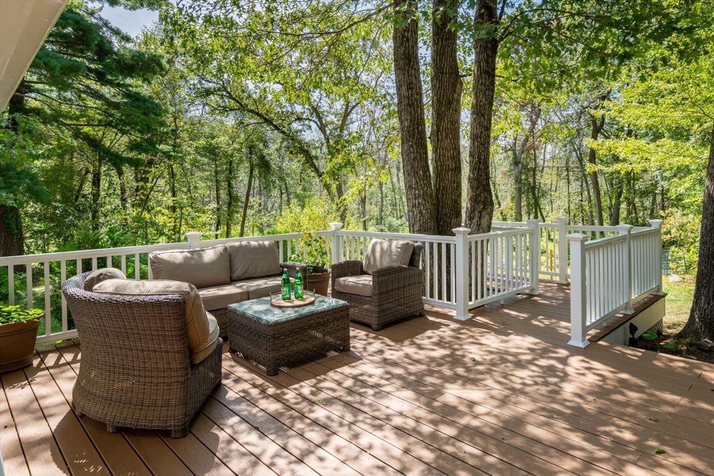 96 Conant Road Weston, MA 02493 - Photo 39 of 42 a view of a patio with couches and potted plants