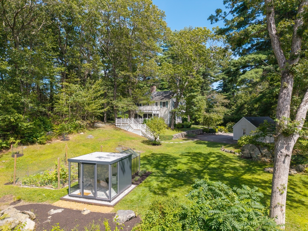 96 Conant Road Weston, MA 02493 - Photo 5 of 42 a view of a yard with swimming pool