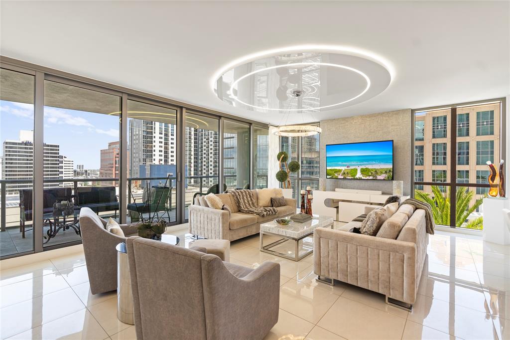 100 East Las Olas Boulevard, Unit 1901 Fort Lauderdale, FL 33301 - Photo 18 of 83 a living room with furniture and a large window