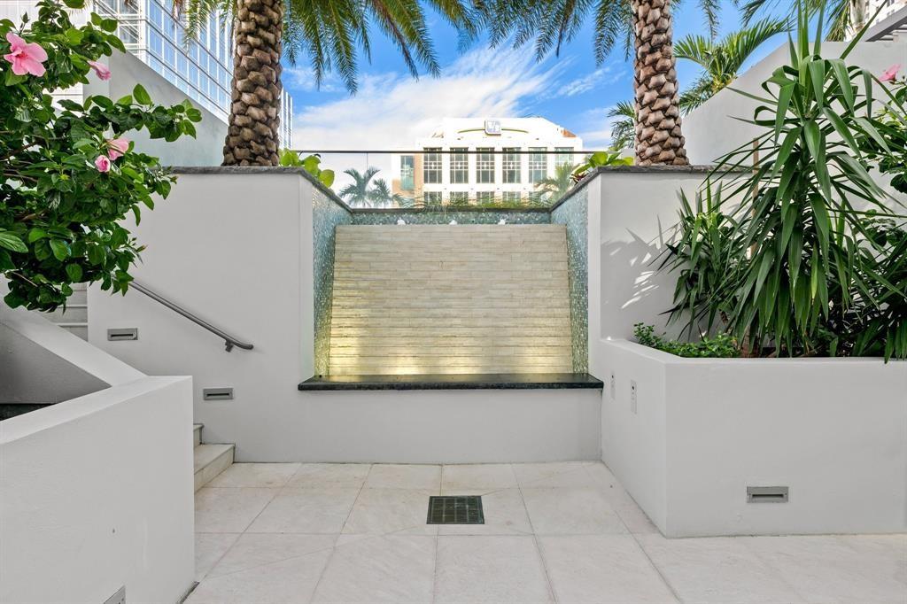 100 East Las Olas Boulevard, Unit 1901 Fort Lauderdale, FL 33301 - Photo 72 of 83 a view of bathroom with a potted plant and a shower