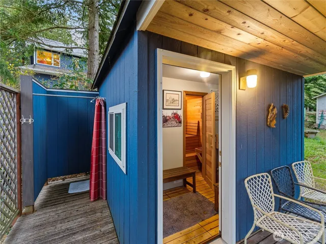 a view of a door and chair in the balcony