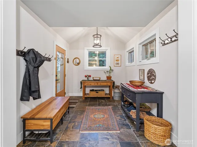 a room with furniture and a window