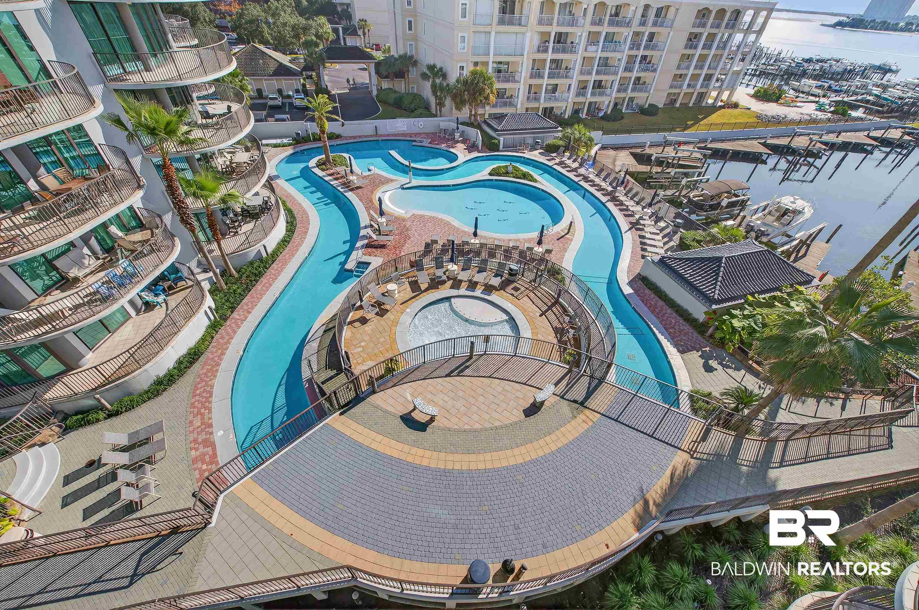 27582 Canal Road, Unit 2507 Orange Beach, AL 36561 - Photo 55 of 75 Bird's eye view of numerous boat docks and a nearby body of water