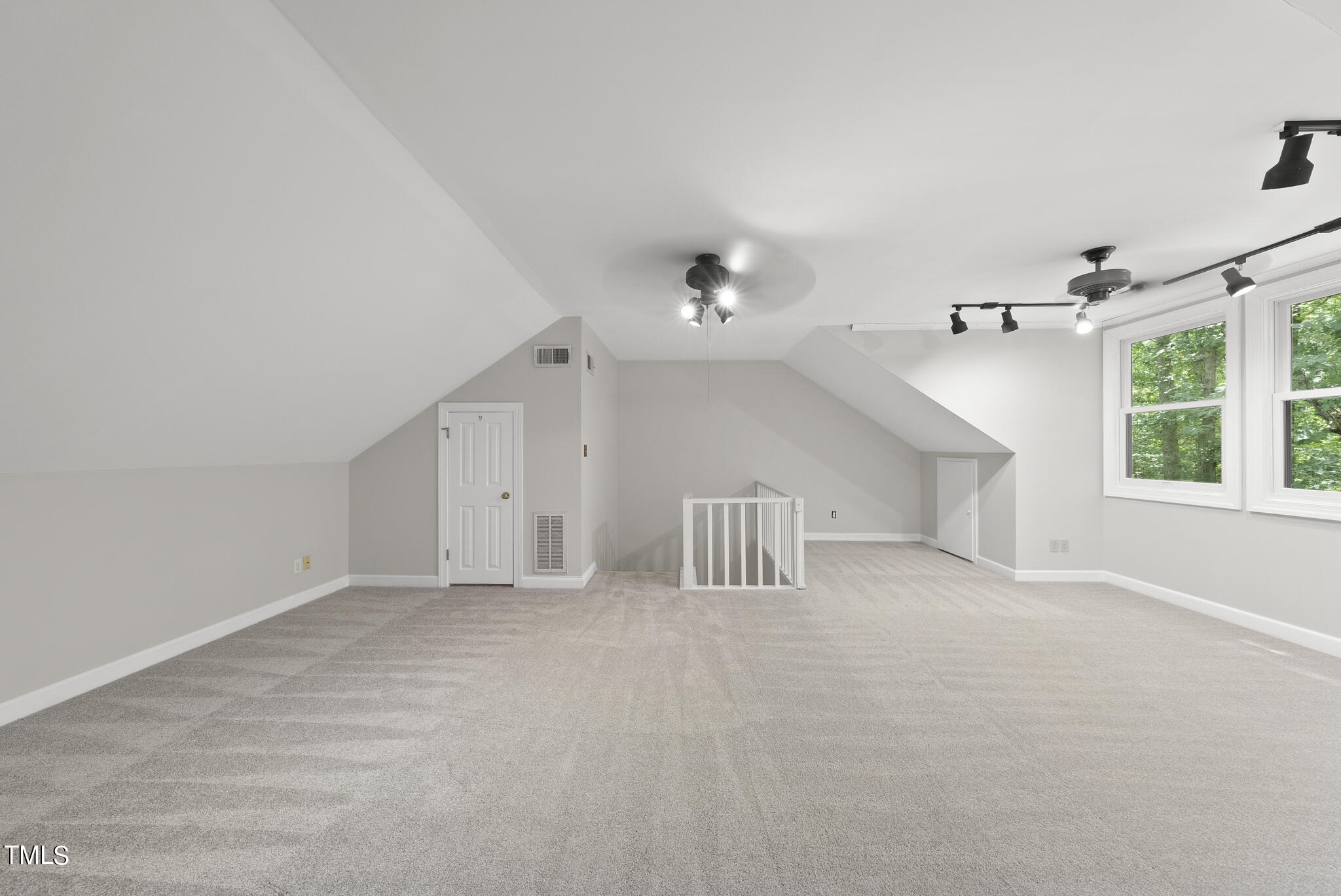 628 Weathergreen Drive Raleigh, NC 27615 - Photo 22 of 30 HUGE 3rd floor bonus with great natural light and tons of storage