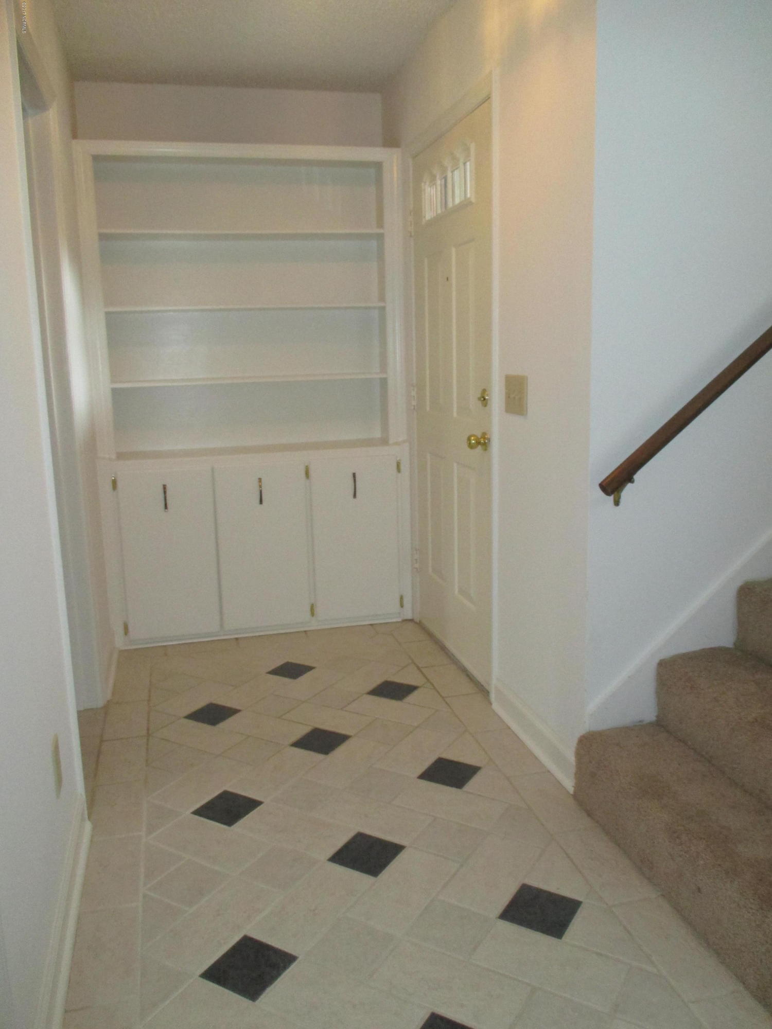 1920 Quail Ridge Road, Unit H Greenville, NC 27858 - Photo 2 of 28 Front Foyer with Built-ins