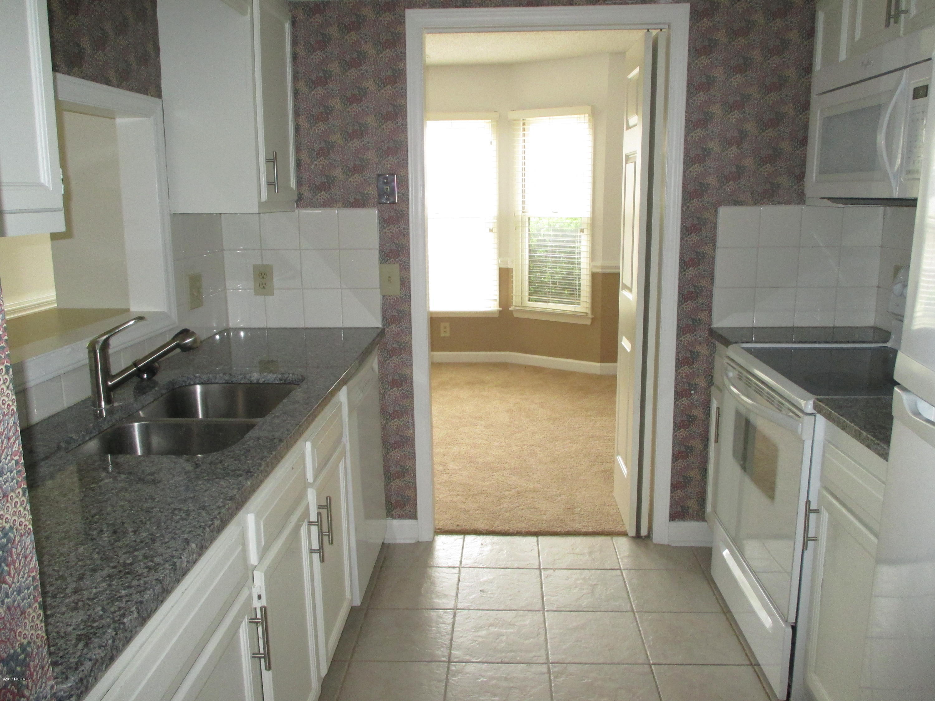 1920 Quail Ridge Road, Unit H Greenville, NC 27858 - Photo 8 of 28 Kitchen to Dining