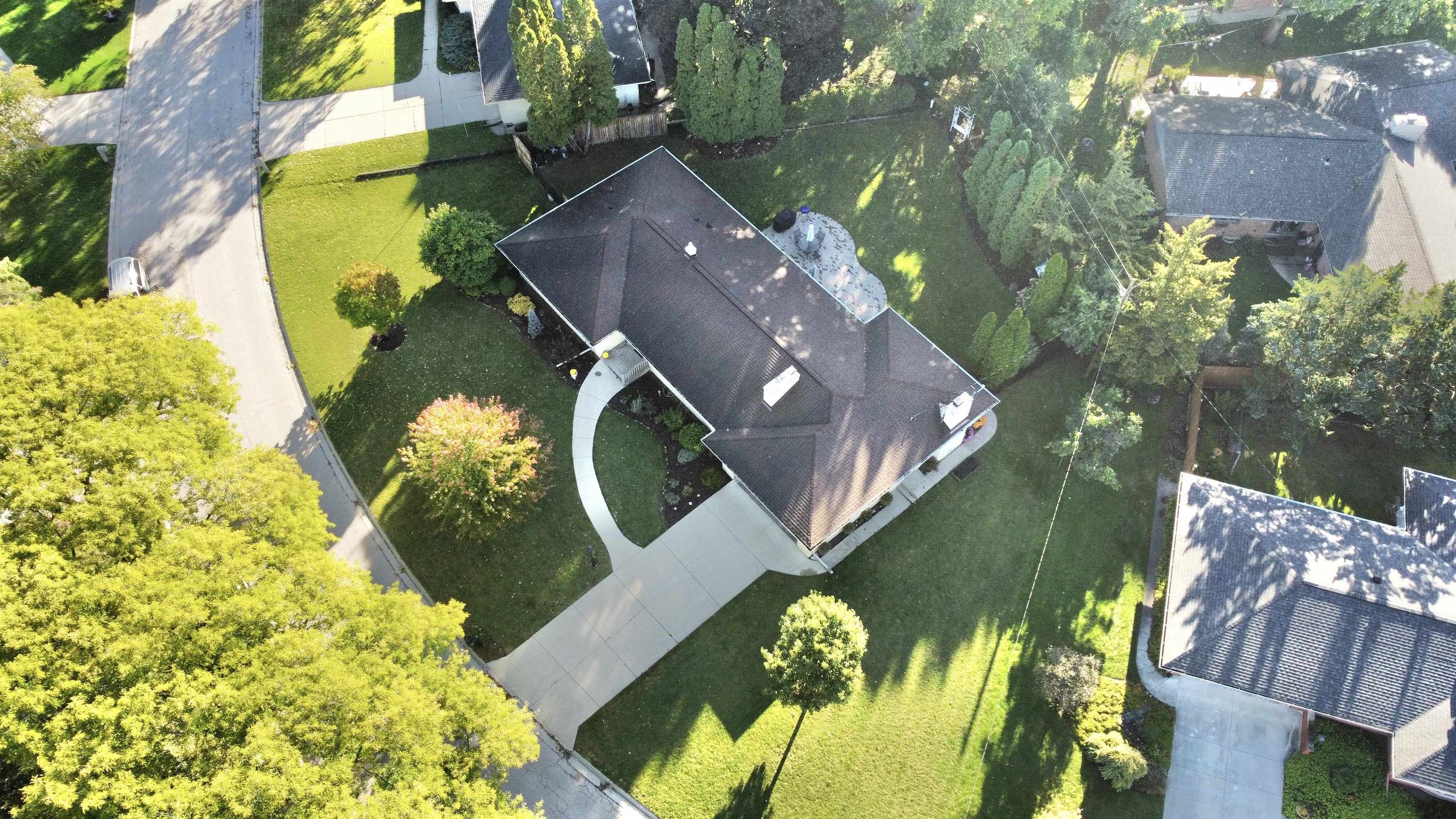 4115 Landstrom Road Rockford, IL 61114 - Photo 8 of 45 an aerial view of a house with swimming pool and outdoor seating