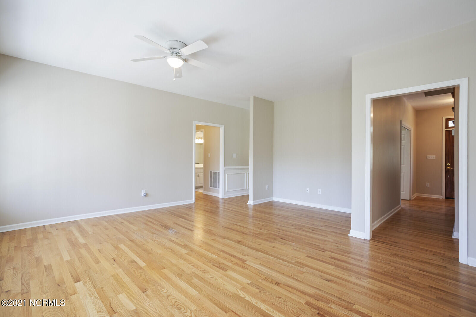 1228 Liberty Landing Road Southeast Winnabow, NC 28479 - Photo 11 of 94 Family Room has refinished hardwood floors