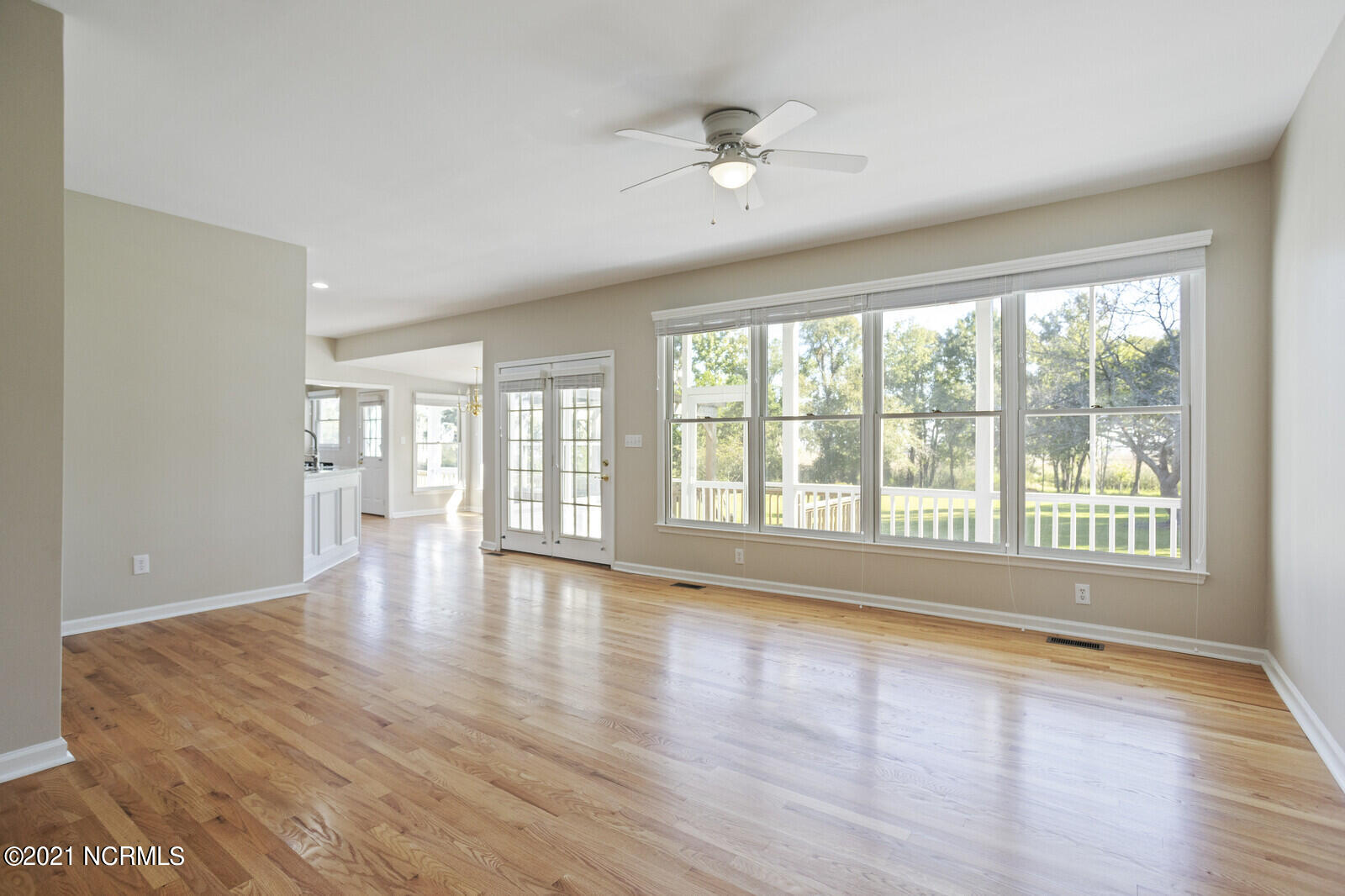 1228 Liberty Landing Road Southeast Winnabow, NC 28479 - Photo 13 of 94 Family Room has refinished hardwood floors