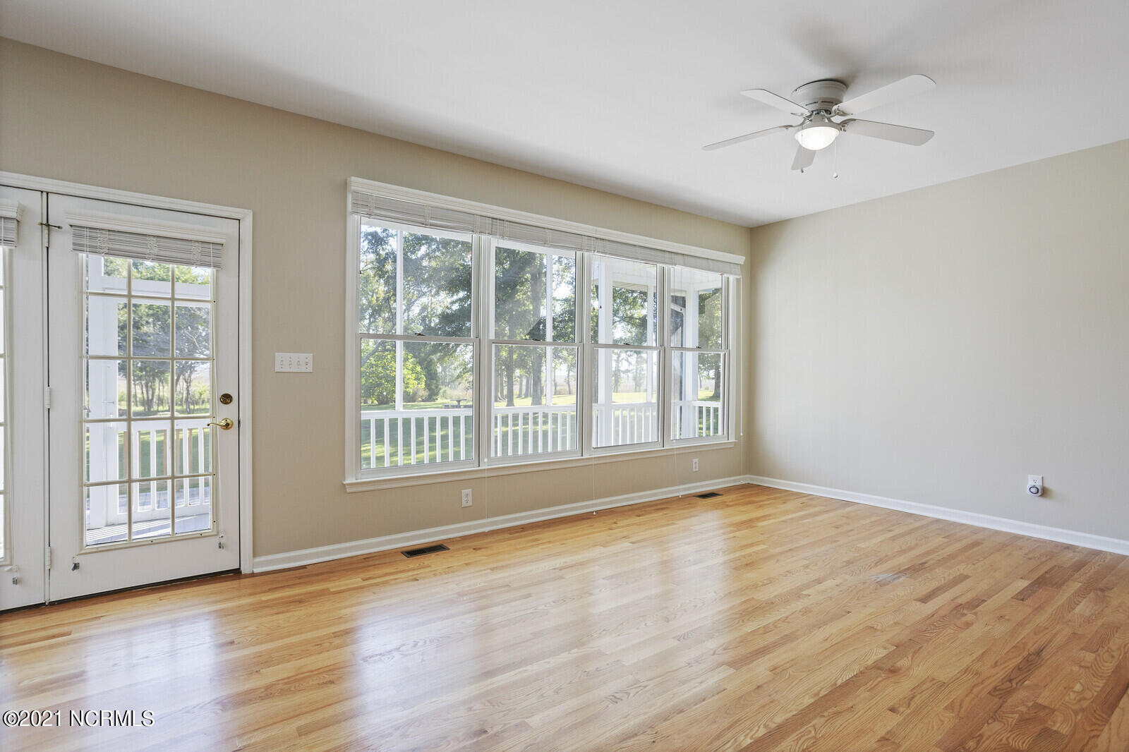1228 Liberty Landing Road Southeast Winnabow, NC 28479 - Photo 14 of 94 Family Room has refinished hardwood floors