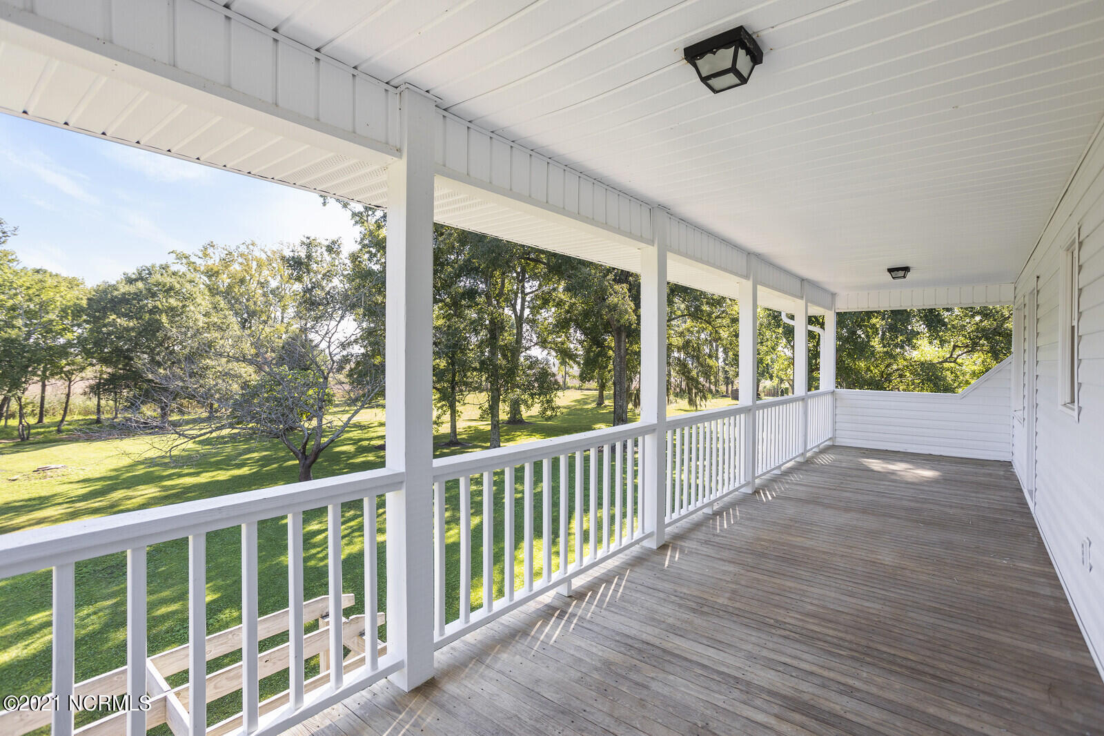1228 Liberty Landing Road Southeast Winnabow, NC 28479 - Photo 49 of 94 Balcony off master bath and bedroom 4 overlooks back yard.