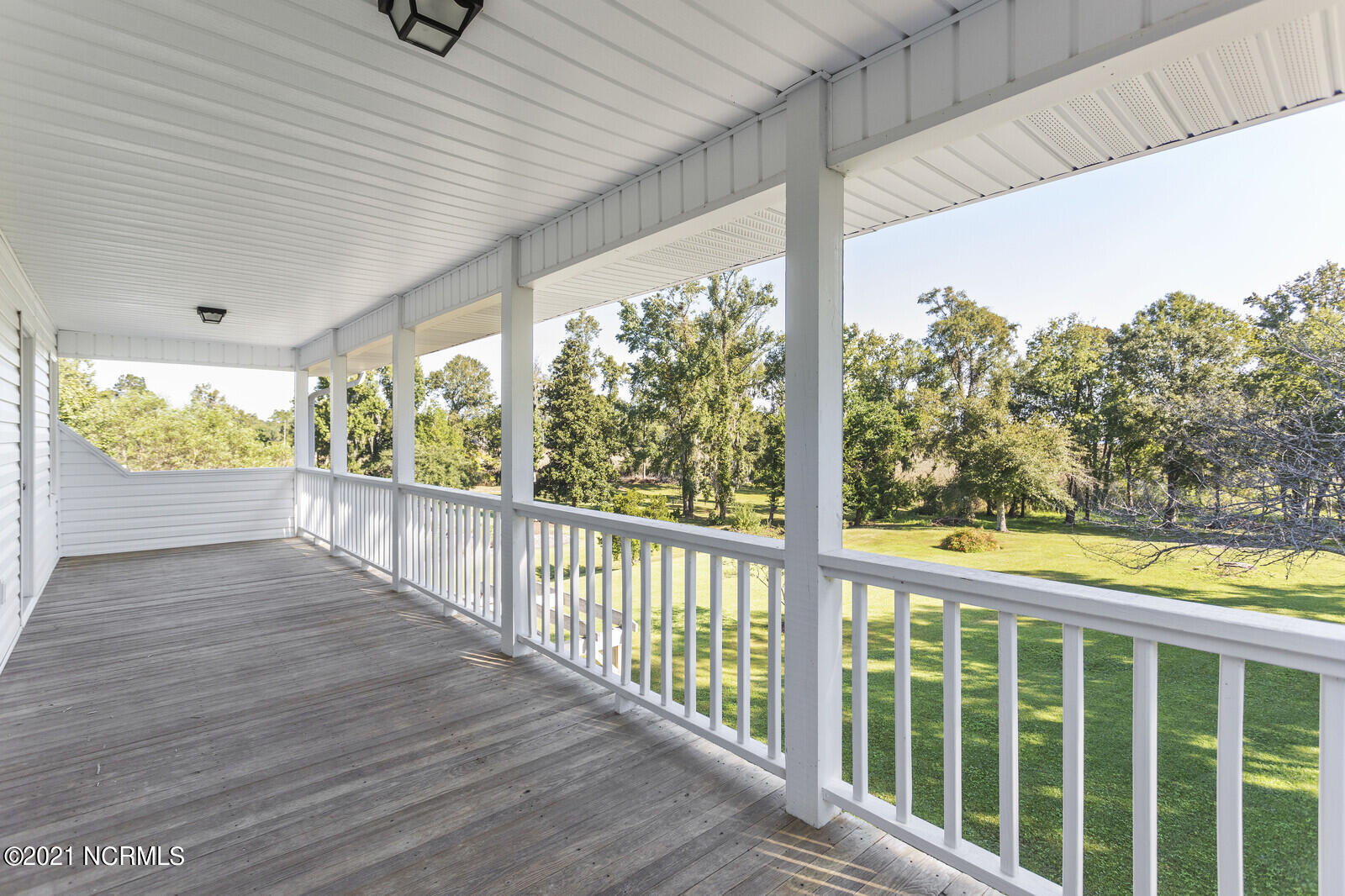 1228 Liberty Landing Road Southeast Winnabow, NC 28479 - Photo 50 of 94 Balcony off master bath and bedroom 4 overlooks back yard.