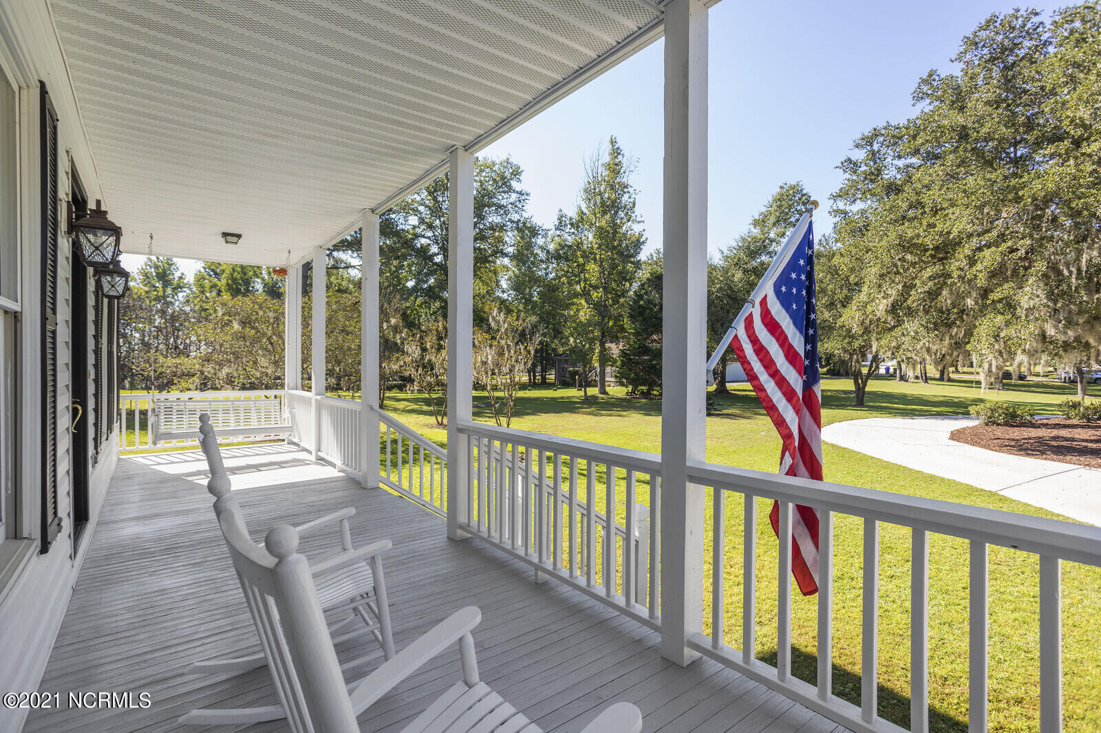 1228 Liberty Landing Road Southeast Winnabow, NC 28479 - Photo 5 of 94 Rocking chair front porch