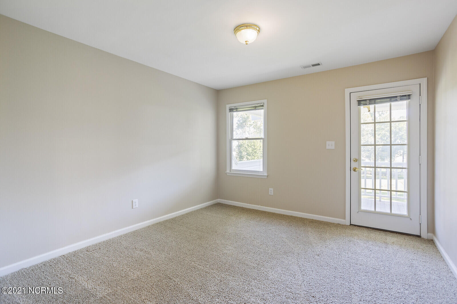 1228 Liberty Landing Road Southeast Winnabow, NC 28479 - Photo 52 of 94 Bedroom 4 - 2nd floor has French door to balcony.